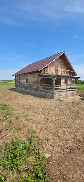 Mihailesti, cabana de vanzare din lemn masiv, 500 mp teren, potential investitie.